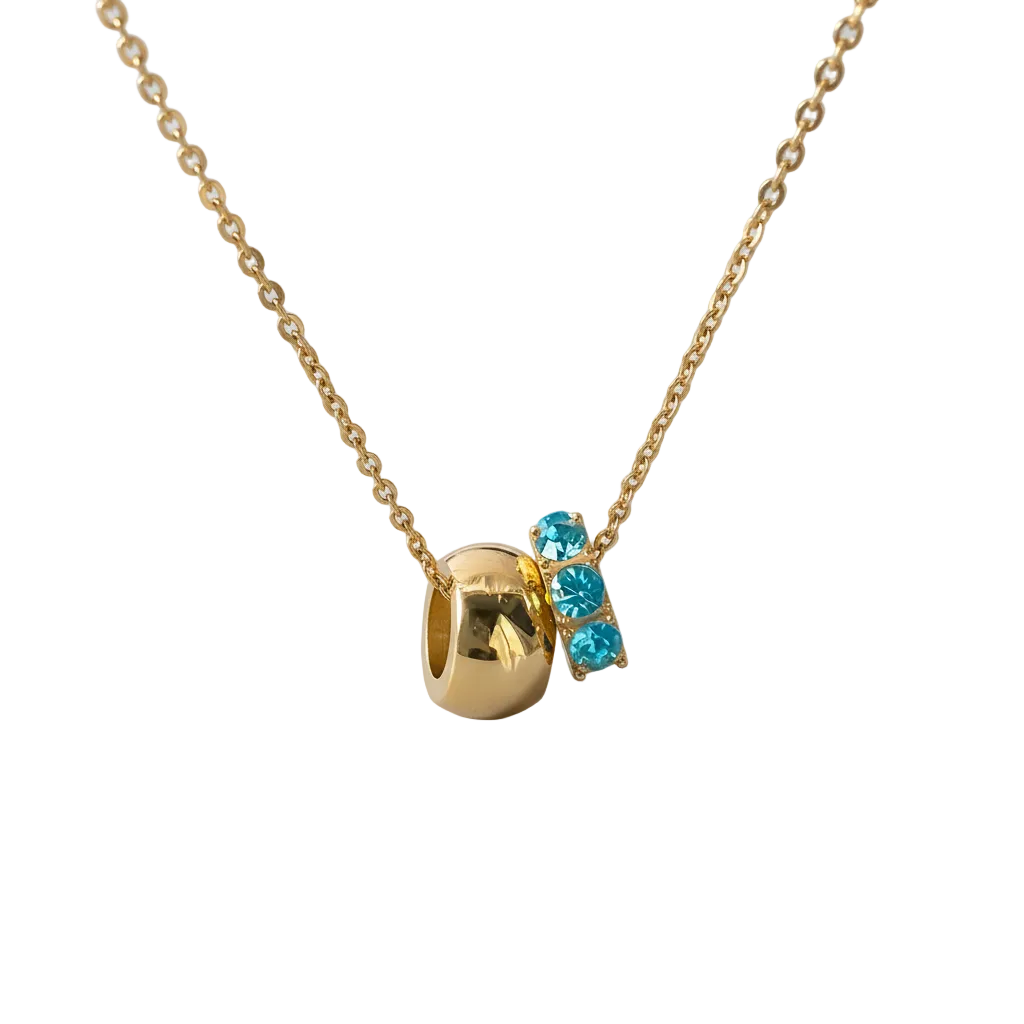 Gold birthstone charm necklace as a meaningful gift for mum