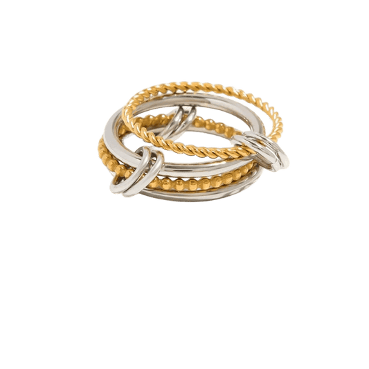 Two-tone gold and silver interlocking ring by Savaé Design