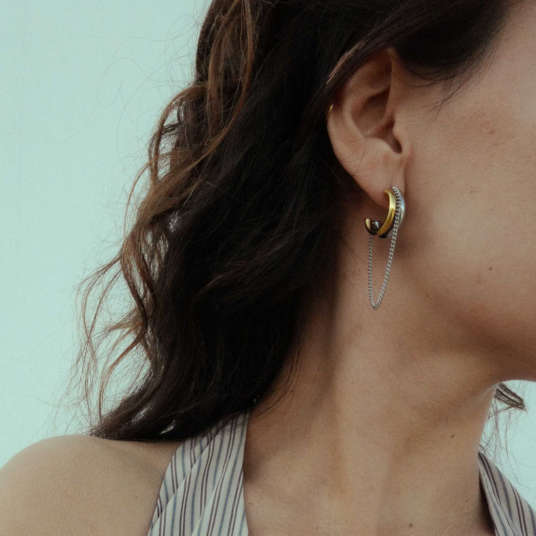 Savaé earrings arranged for an earring stack guide